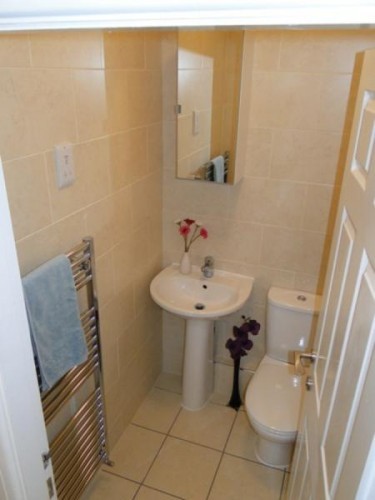Luxury fully tiled separate WC
